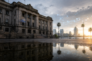 Old public building reflected in dark water as a symbol of bureaucratic stagnation in Uruguay.