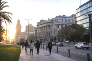 Realistic editorial photograph of Montevideo symbolizing institutional reform, economic modernization and social cohesion.