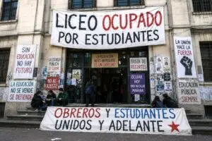 Students gathering outside an occupied public high school in Uruguay