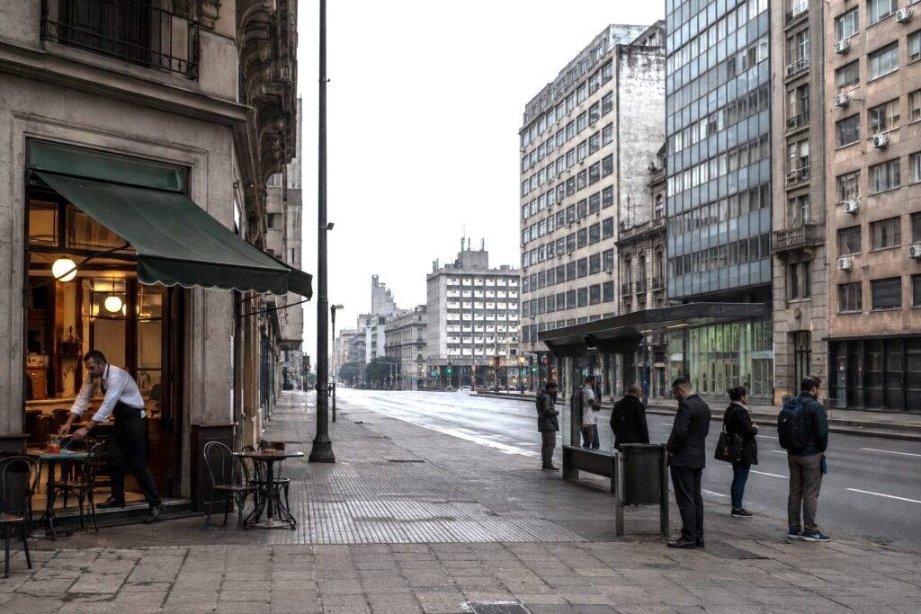 Quiet morning in downtown Montevideo symbolizing economic stagnation beneath institutional stability.