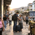 Venezuelan urban street showing economic hardship, migration and the human challenges of national reconstruction.